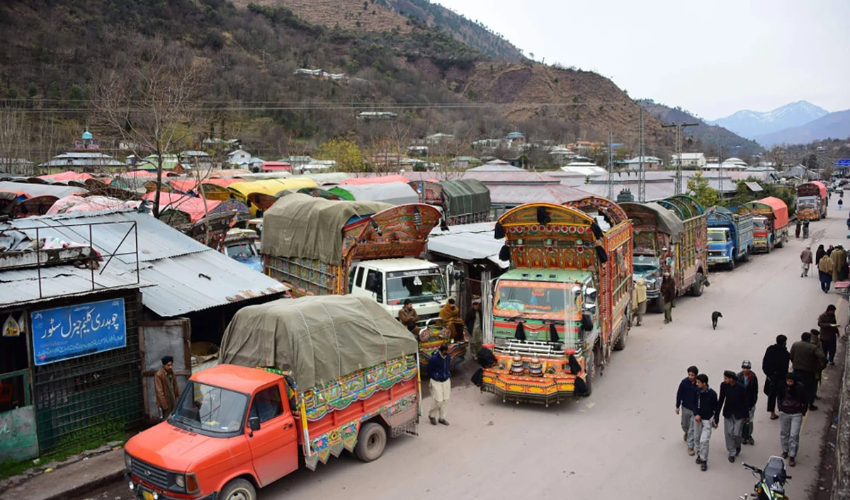 Goods trucks at the border town of Chakothi in Azad Kashmir, some 3 km from Line of Control on Feb 20, 2019. Following the Pulwama attack, India revoked MFN status to Pakistan and slammed 200 per cent import duty on imports. (AFP/File)