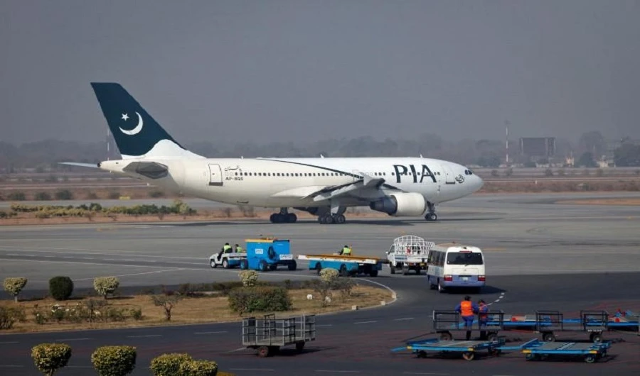 A Pakistan International Airlines (PIA) plane prepares to take-off at Allama Iqbal International Airport in Lahore, Pakistan, on February 1, 2012. (REUTERS)