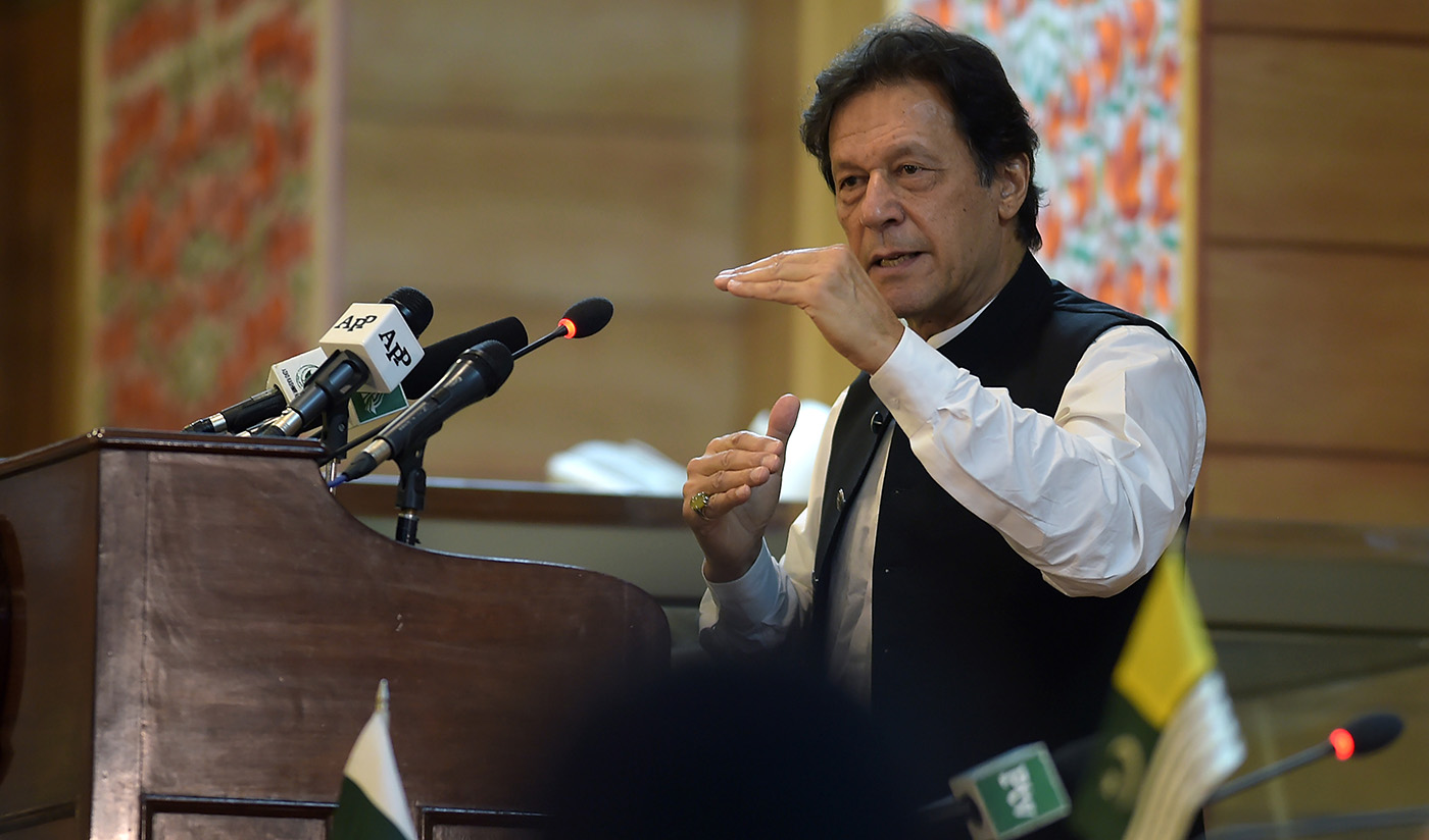 In this file photo, Pakistan's Prime Minister Imran Khan addresses the legislative assembly in Muzaffarabad on Aug. 14, 2019. (AFP)