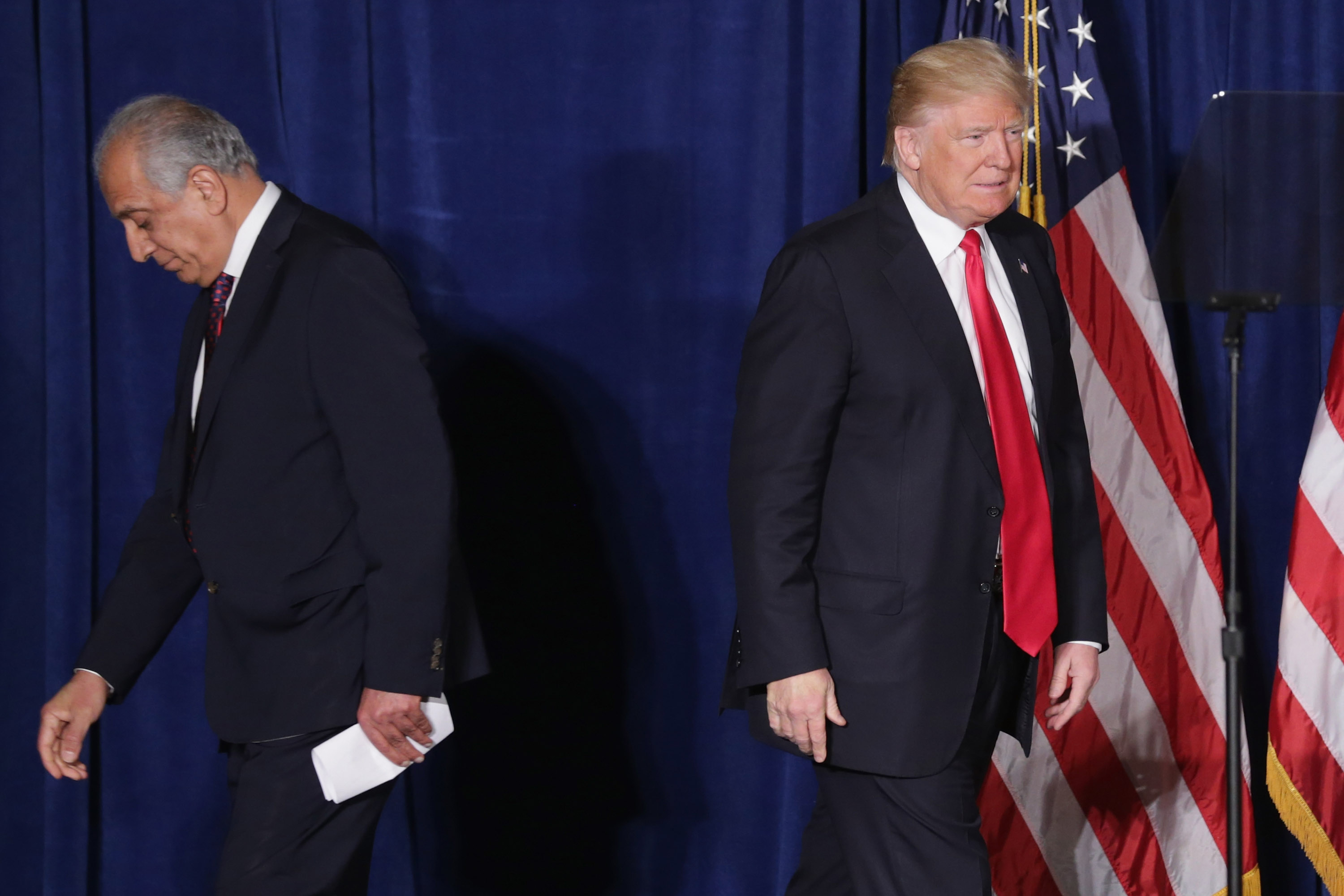 In this file photo taken on April 27, 2016 Republican presidential candidate Donald Trump (R) takes the stage after being introduced by former US Ambassador to Iraq and Afghanistan Zalmay Khalilzad at the Mayflower Hotel in Washington, DC. US President Donald Trump said Saturday August 7 he had called off a secret summit with the Taliban and Afghanistan’s leader, abruptly slamming the door on a year of diplomacy to end America’s longest war. (AFP)
