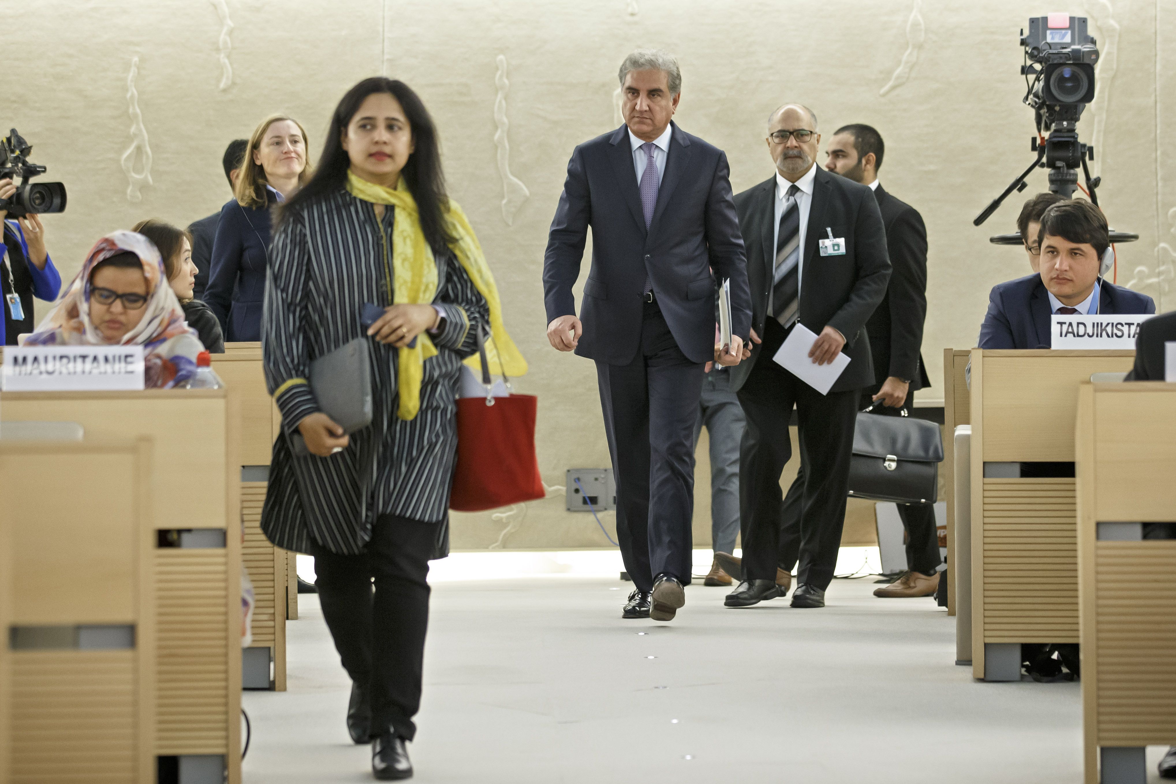 Pakistan's Foreign Minister Shah Mehmood Qureshi, center, arrives for a statement during the 42nd session of the Human Rights Council at the European headquarters of the United Nations in Geneva, Switzerland, Tuesday, Sept. 10, 2019. ( AP photo)