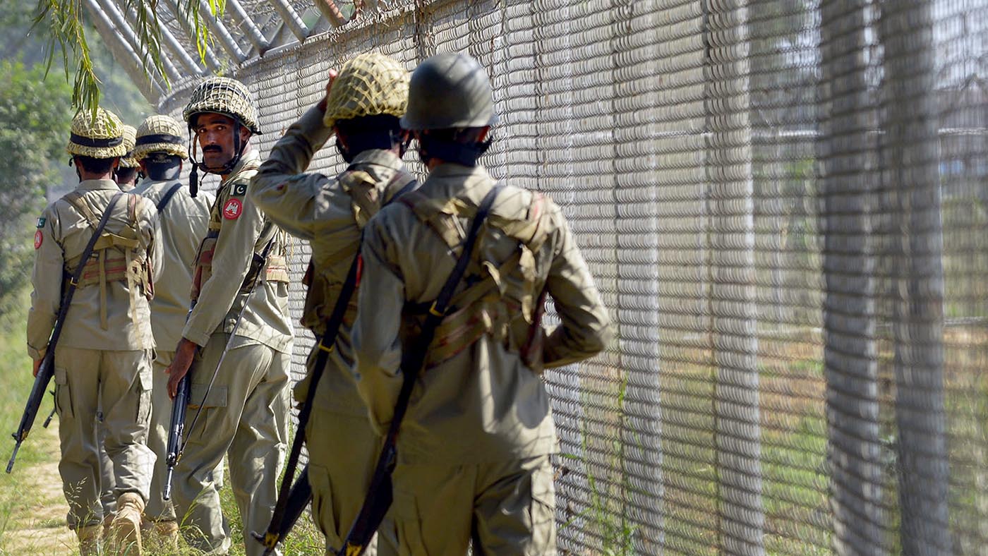 In this file photo, Pakistani Rangers patrol along the Pakistan-India border area of Wagah on Oct. 16, 2014. (AFP)