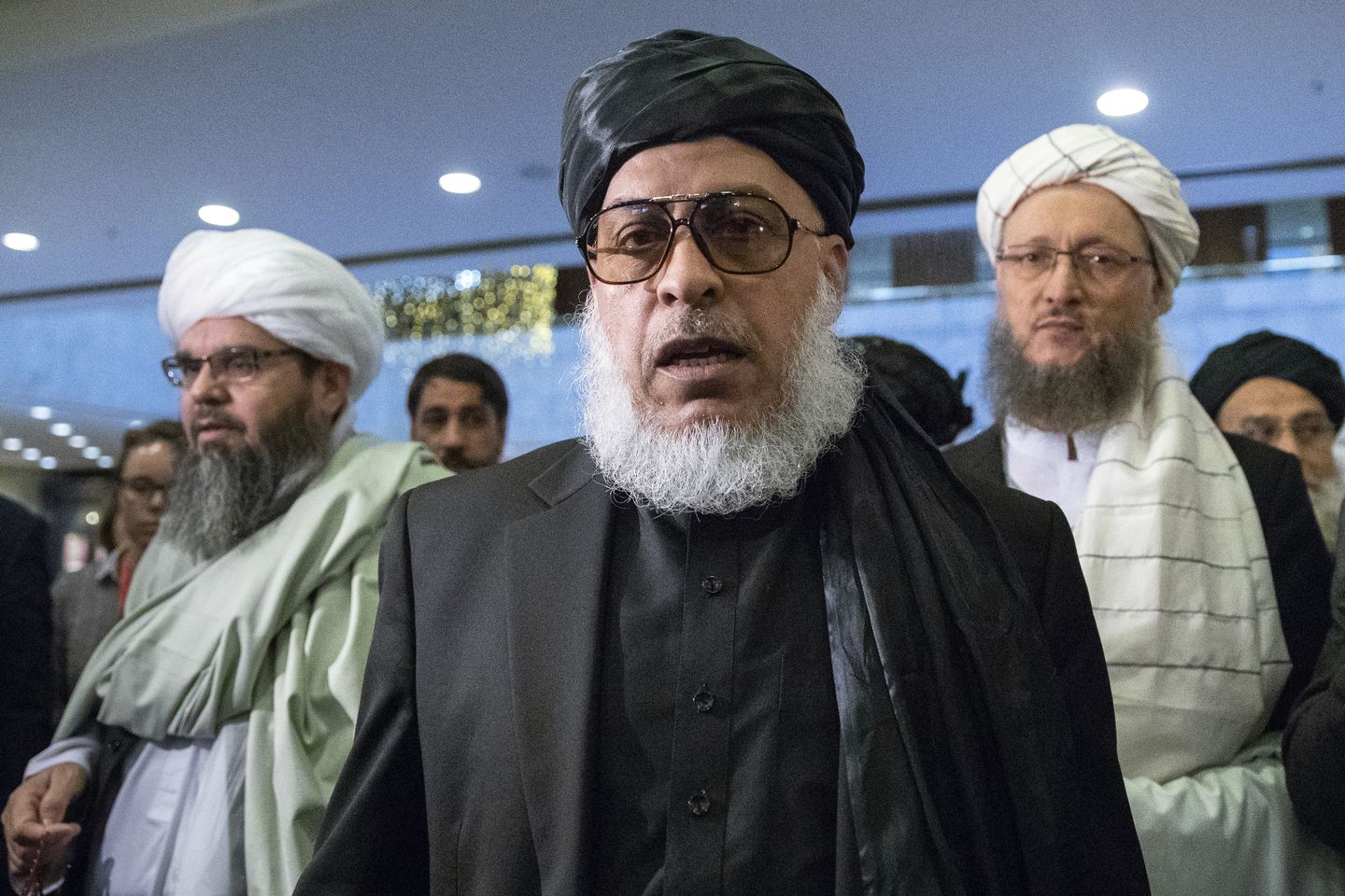 Taliban Mullah Abbas Stanikzai, center, attends “intra-Afghan” talks in Moscow on Feb. 6. (AP)