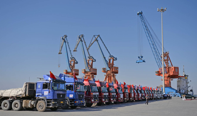 In this file photo, Chinese trucks stand on a pontoon during the opening of a trade project in Gwadar port, some 700 kms west of the Pakistani city of Karachi on Nov. 13, 2016. (AFP)