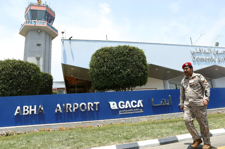 A security officer walks past the Abha airport in Saudi Arabia after it was attacked by Yemen's Houthi group on June 13. (Reuters)