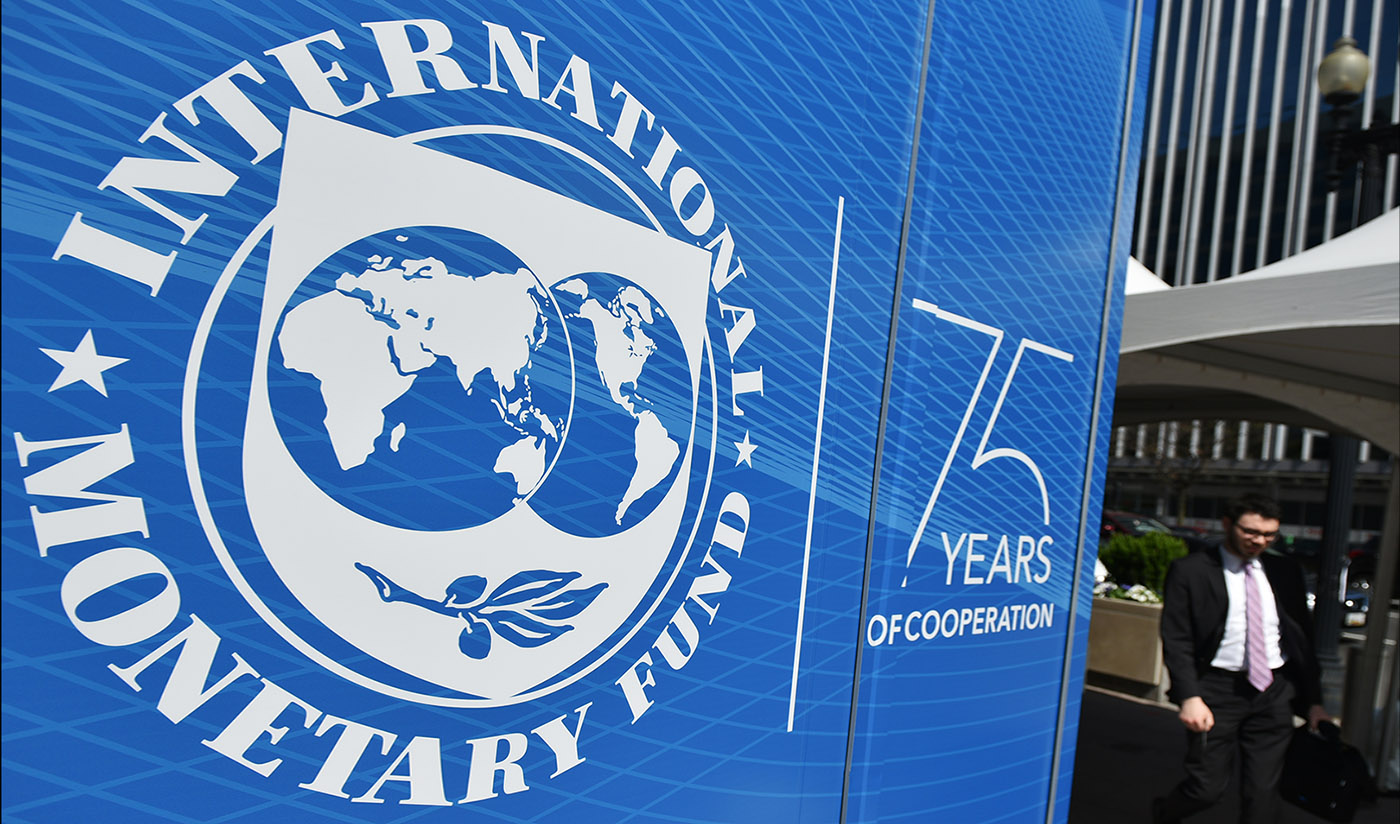 The seal of the International Monetary Fund (IMF) is seen outside of the headquarters building in Washington, DC on April 8, 2019. (AFP/File)