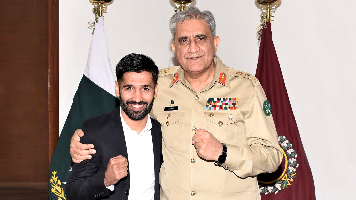 Pakistan’s flyweight boxer Muhammad Waseem poses for a picture with the country’s army chief, Gen. Qamar Javed Bajwa, in Rawalpindi on Sept. 18, 2019. (Photo Courtesy: Muhammad Waseem)