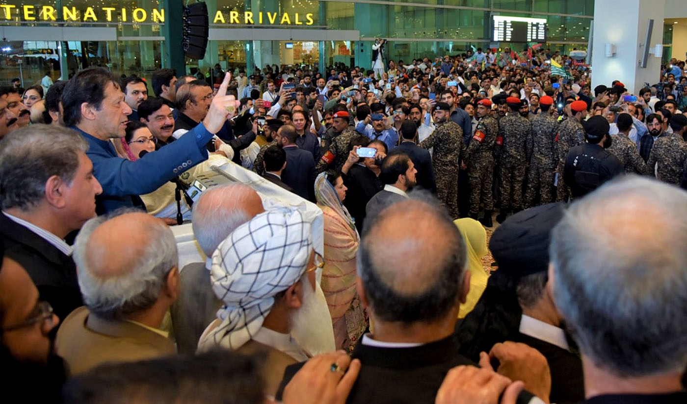 Pakistan's Prime Minister addresses a gathering after arriving at Islamabad International Airport on Sept. 29, 2019. (PID)