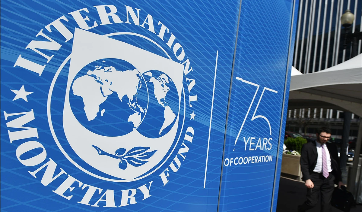 The seal of the International Monetary Fund (IMF) is seen outside of the headquarters building in Washington, DC on April 8, 2019. (AFP/File)