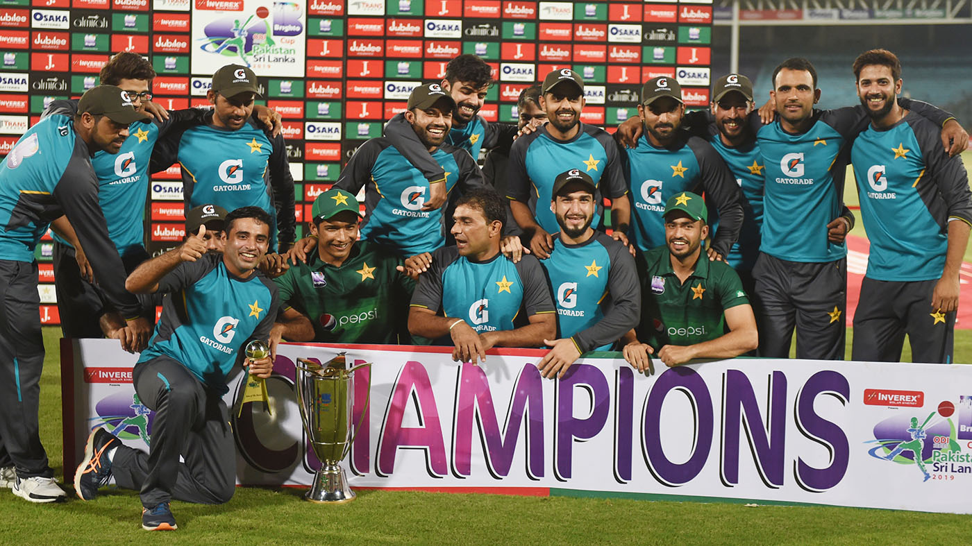 Pakistan's cricketers pose for a photograph with their trophy after winning the third and final one day international (ODI) cricket match between Pakistan and Sri Lanka in Karachi on Oct. 2, 2019. (AFP)