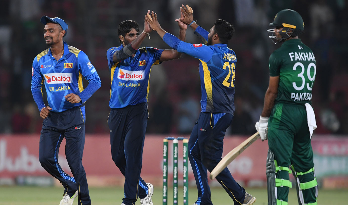 Sri Lanka's cricketers celebrate after the dismissal of Pakistan's batsman Fakhar Zaman (R) during the third and final one day international (ODI) cricket match between Pakistan and Sri Lanka in Karachi on Oct. 2, 2019. (AFP)