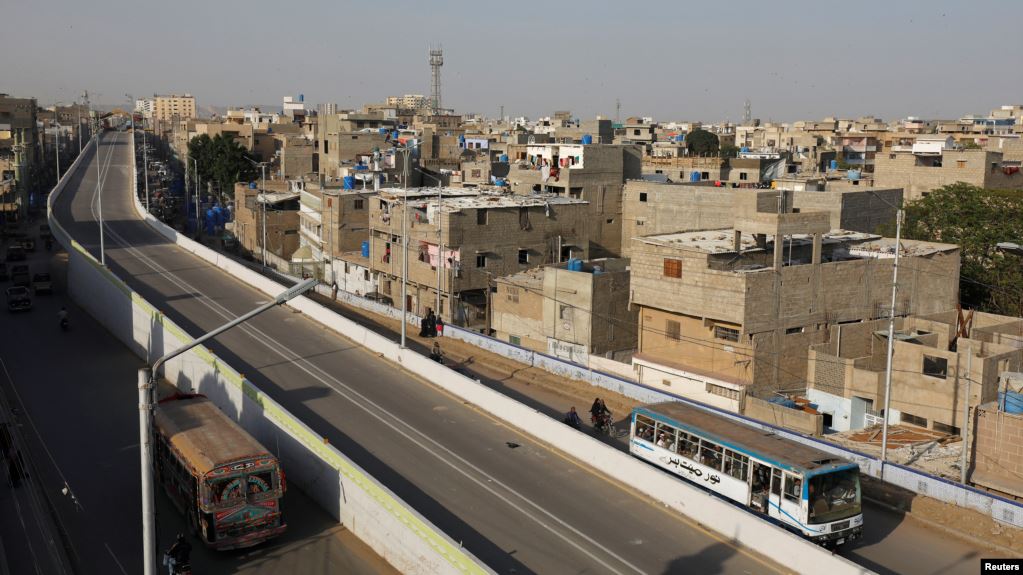 General view of the elevated corridor of the Green Line Bus Rapid Transit system along a low income neighborhood Karachi on January 31, 2019. (File/ Reuters)