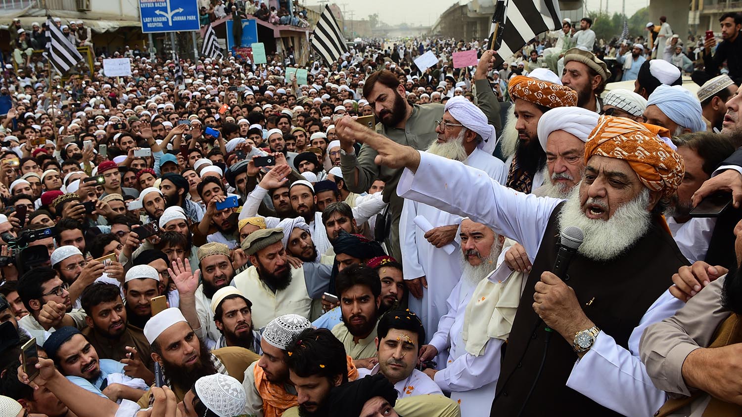 In this file photo, head of Jamiat Ulema Islam (JUI) Maulana Fazalur Rehman speaks to supporters during a rally in Peshawar on Nov. 2, 2018. (AFP)