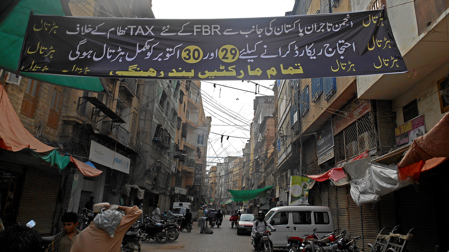 A banner announcing the strike against the government’s tax policies is displayed at Karachi’s Bolton Market. Picture taken on Oct. 29, 2019. (AN Photo)