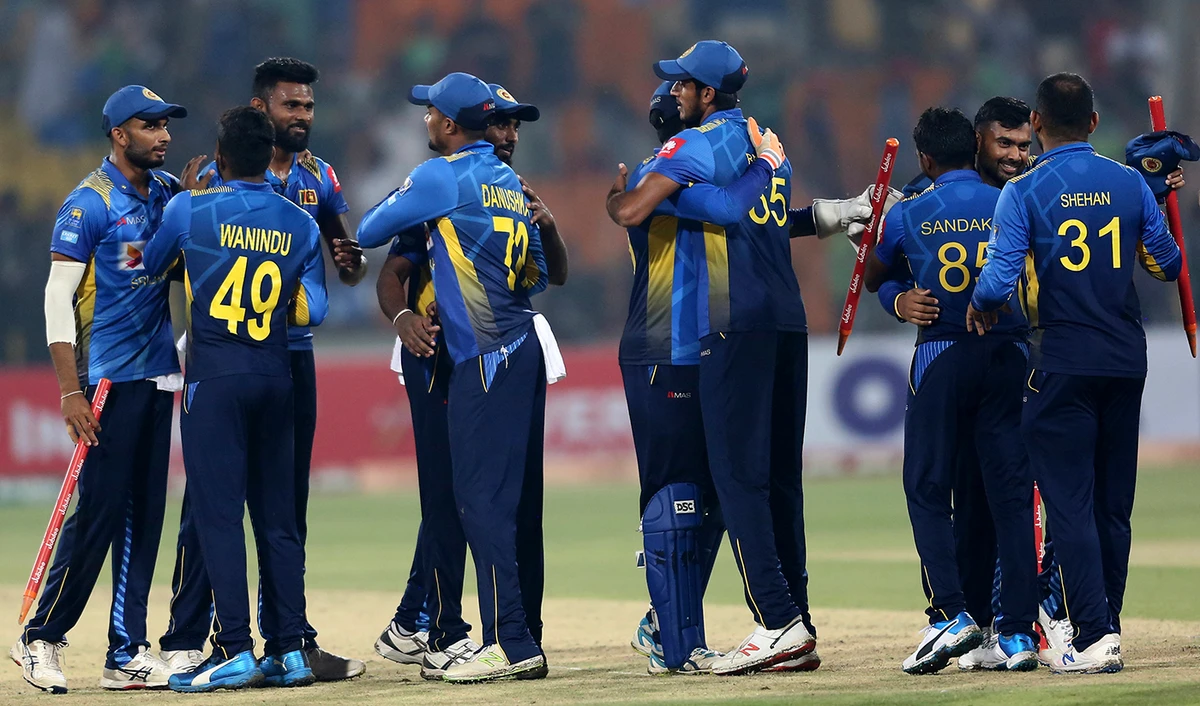 Sri Lankan players congratulate each other after the winning the first Twenty20 match against Pakistan at Gaddafi stadium in Lahore, Pakistan on Oct. 5, 2019. (AFP)