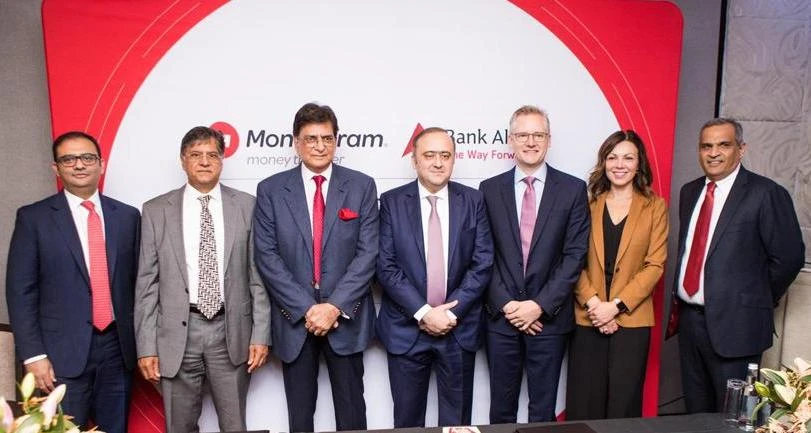 Sahibzada Jahangir, Spokesperson of Prime Minister Imran Khan for Trade and Investment for UK and Europe along with Alex Holmes, CEO of MoneyGram, and Bilal Asghar, Bank Alfalah’s Group Head for Corporate, Investment Banking & International Business Division pose for photograph in London at launch of bank deposit service by MoneyGram. (Photo courtesy: Bank Alfalah)