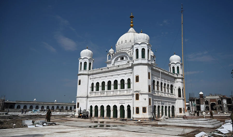 In this picture taken on September 16, 2019 a Pakistani policeman stands guard on the construction site at the Sikh religious site Gurdwara Darbar Sahib, in the Pakistani town of Kartarpur near the Indian border. Pakistan on September 16 announced that the Kartarpur corridor will be opened for Indian Sikh pilgrims early this November. (AFP)