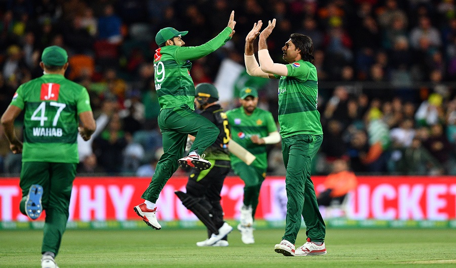 Pakistan's paceman Mohammad Irfan (R) celebrates his wicket of Aaron Finch of of Australia with teammates during the second Twenty20 match between Australia and Pakistan at the Manuka Oval in Canberra on November 5, 2019. (AFP)