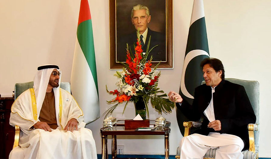 In this handout photograph released by Pakistan's Press Information Department (PID) on January 6, 2019, Pakistan's Prime Minister Imran Khan (R) speaks with Abu Dhabi's Crown.