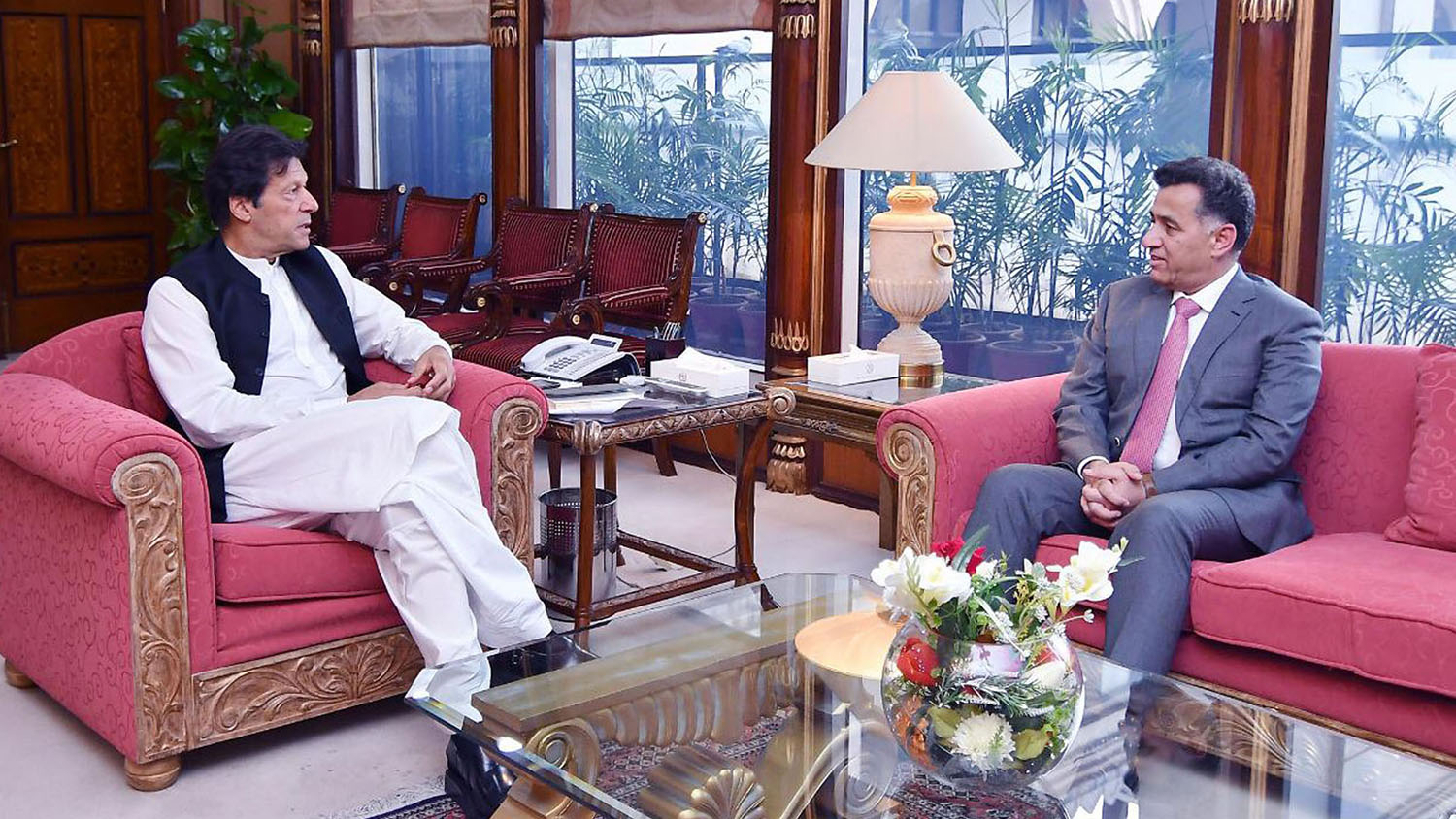 Prime Minister of Pakistan Imran Khan, left, meeting Director General of Inter-Services Intelligence (ISI), Lieutenant-General Faiz Hameed at the PM office in Islamabad on June 18, 2019. (PID/File)