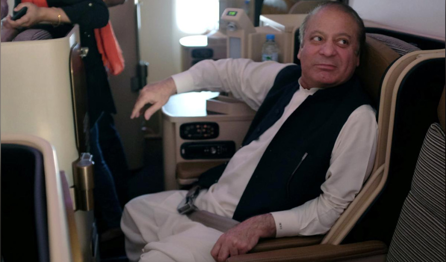 Ousted Pakistani Prime Minister Nawaz Sharif sits on a plane after landing at the Allama Iqbal International Airport in Lahore, Pakistan, July 13, 2018. (REUTERS)
