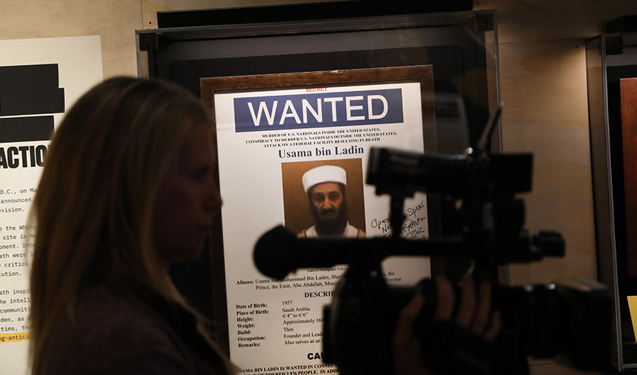 A poster and picture used to identify Osama Bin Laden is displayed at the new exhibition Revealed: The Hunt for Bin Laden at the 9/11 Memorial Museum on November 07, 2019 in New York City. (AFP)