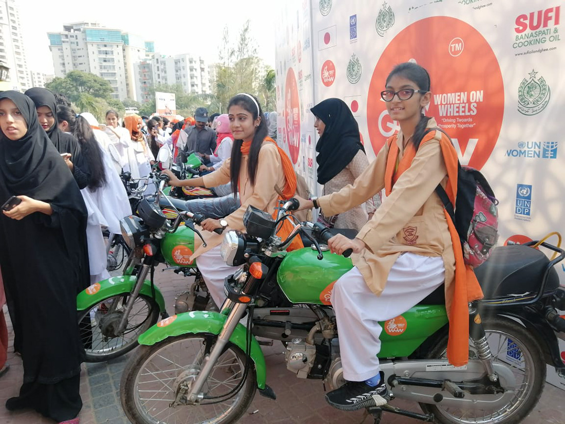 Girls pose for photo with bikes during the inauguration of the Women on Wheels program at Frere hall in Karachi, Pakistan on Nov. 24, 2019. (AN Photo)