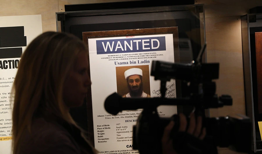A poster and picture used to identify Osama Bin Laden is displayed at the new exhibition Revealed: The Hunt for Bin Laden at the 9/11 Memorial Museum on November 07, 2019 in New York City. (AFP)