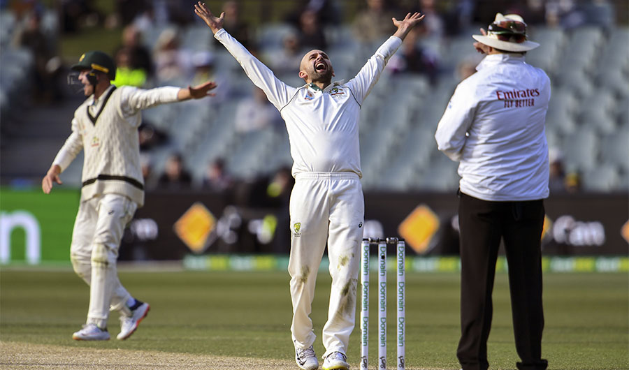 Australia's spinner Nathan Lyon (C) reacts after appealling successfully for an LBW decision against Pakistan's batsman Yasir Shah on the fourth day of the second Test cricket match in Adelaide on December 2, 2019. (AFP)