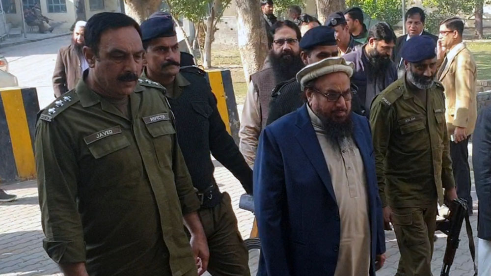 Chief of the proscribed Jamaat-ud-Dawa organization Hafiz Saeed is taken to an Anti-Terrorism Court in Lahore on Dec. 7, 2019. (Supplied)