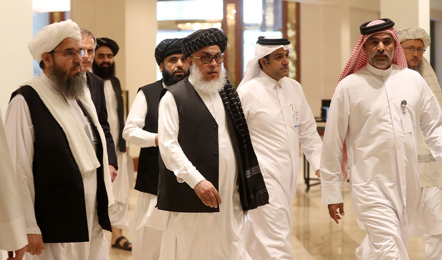 The Taliban's former envoy to Saudi Arabia Shahabuddin Delawar (L) arrives with Taliban Qatar spokesman Suhail Shaheen (C, behind) and Taliban negotiator Abbas Stanikzai (C, front) to attend the Intra Afghan Dialogue talks in the Qatari capital Doha on July 7, 2019. (AFP)