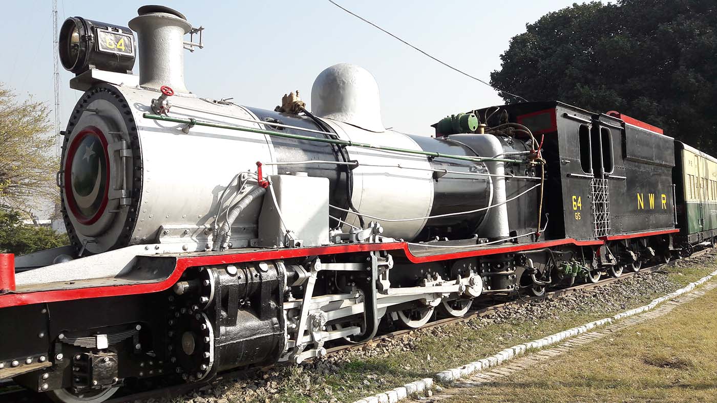 An ancient steam engine is preserved at Pakistan Railways Museum in Islamabad. (AN photo by Aamir Saeed)