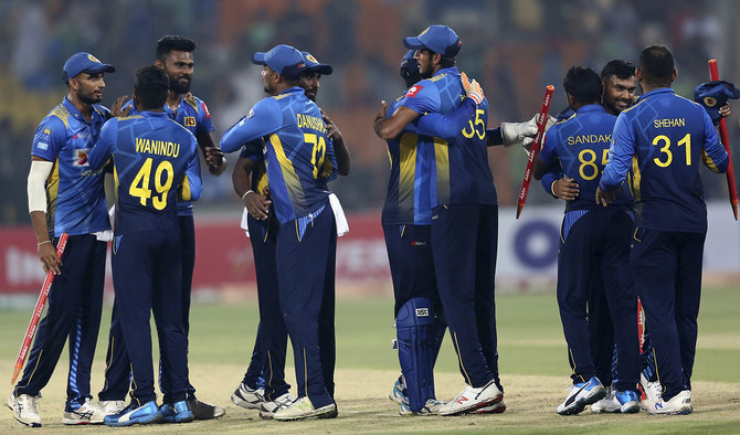 Sri Lankan players congratulate each other after the winning the first Twenty20 match against Pakistan at Gaddafi stadium in Lahore, Pakistan on Oct. 5, 2019. (AFP)