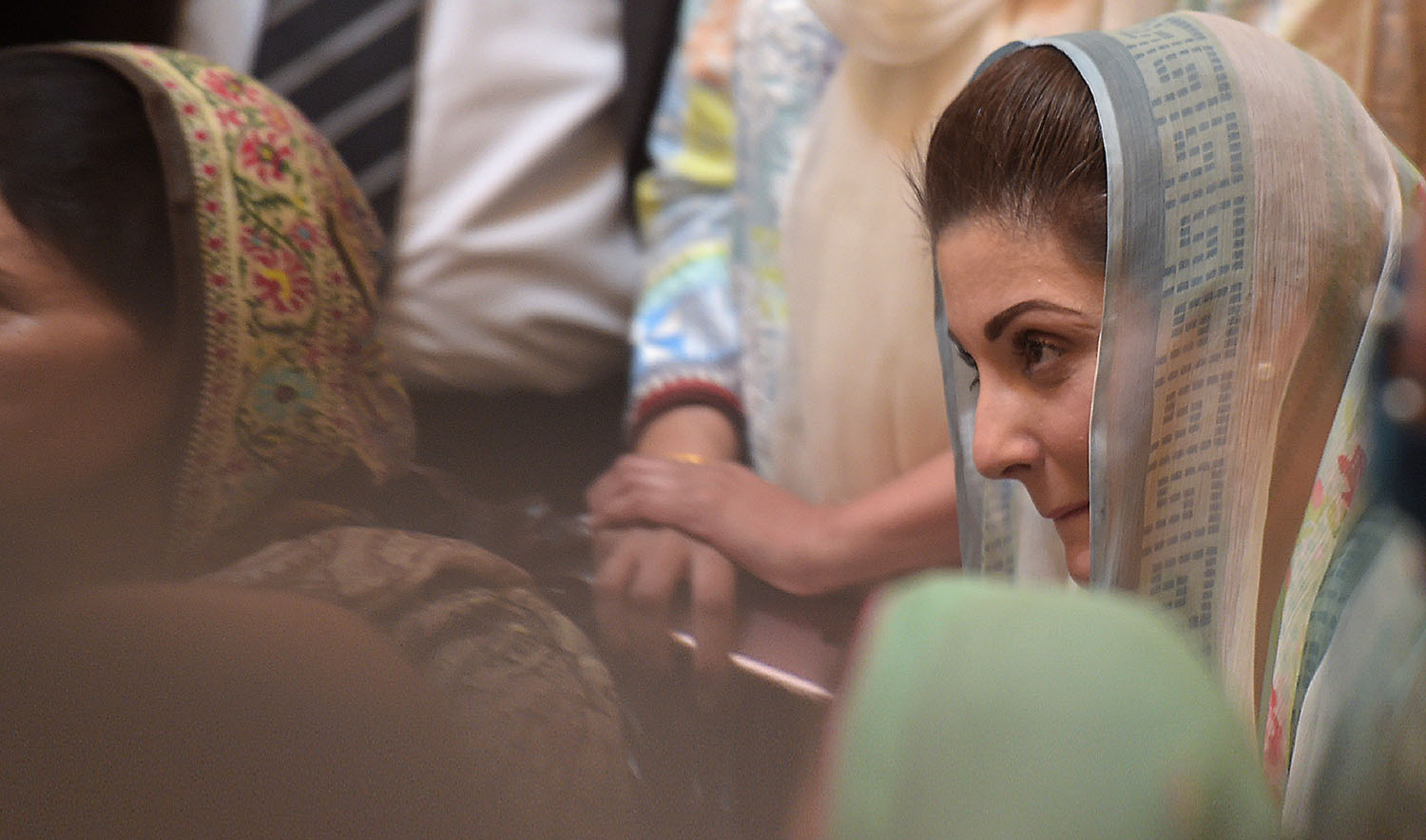 In this file photo, Maryam Nawaz, right, daughter of ousted Pakistani prime minister Nawaz Sharif, attends her father's press conference in Islamabad on May 10, 2018. (AFP)