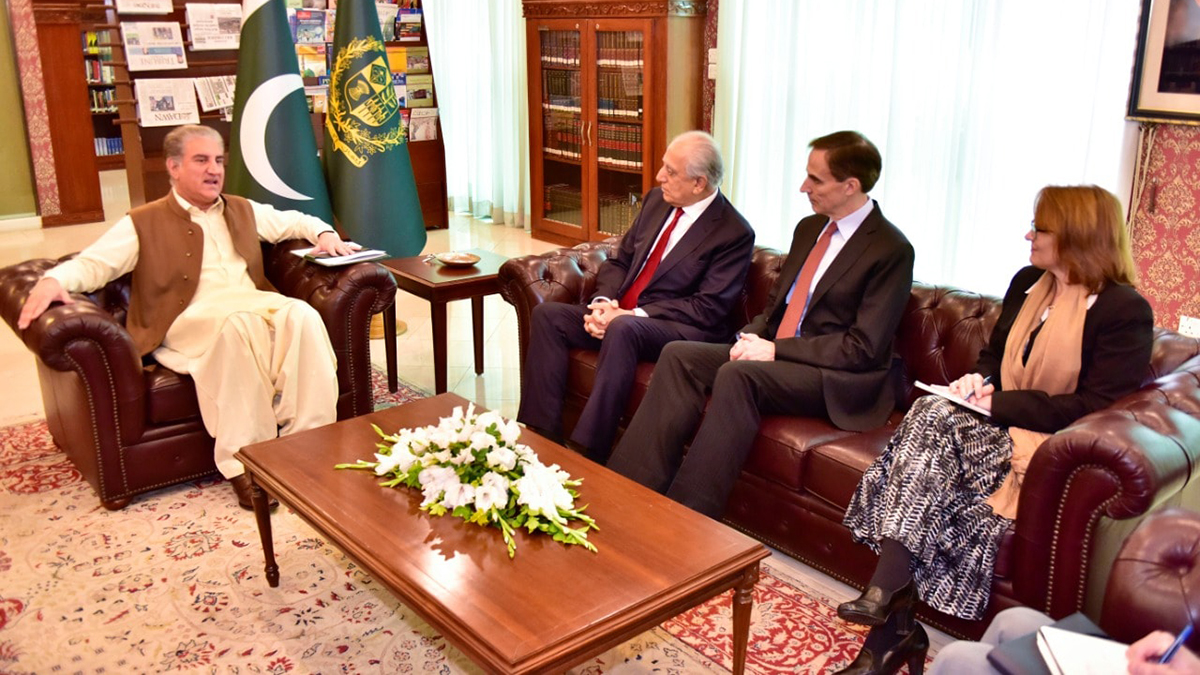 Pakistan's Foreign Minister Shah Mahmood Qureshi, left, receives U.S. Special Representative for Afghanistan Reconciliation Zalmay Khalilzad, center, at his office in Islamabad on Dec. 13, 2019. (Photo courtesy: Radio Pakistan)