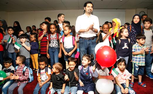 Omar Farooqui with the children at the opening of the academy. (Photo Credit: Hope Academy)