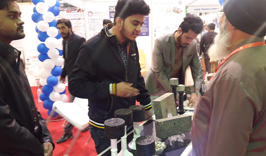 Sir Syed University of Engineering and Technology students introduce their innovations at the Build Asia exhibition in Karachi on Dec. 16, 2019. (AN photo)
