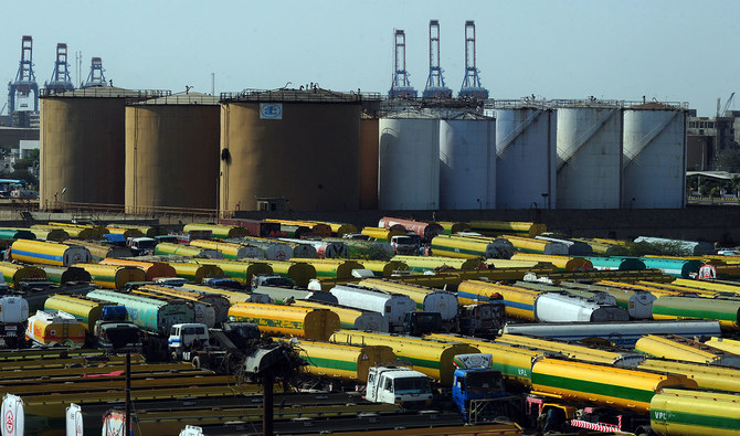 In this file photo, an overview shows tankers parked outside a local oil refinery in the Pakistan's port city of Karachi on Feb. 22, 2011. (AFP)