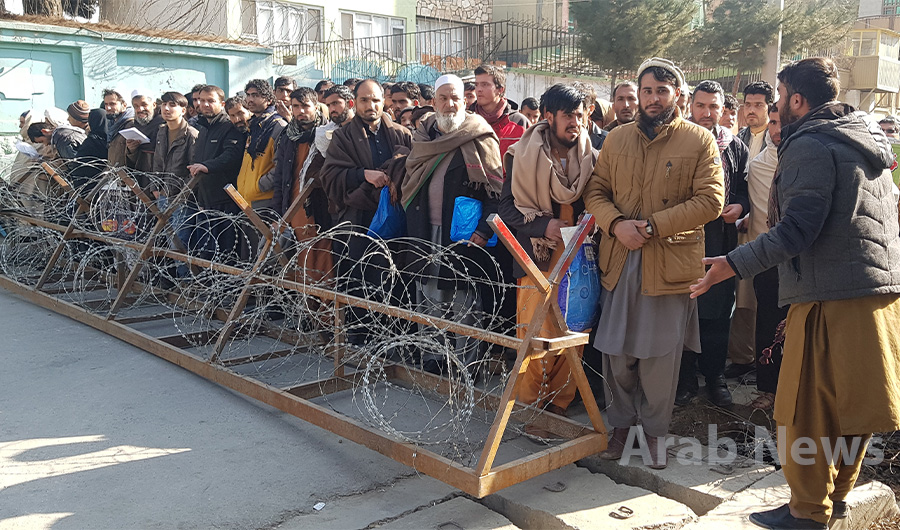 Afghans queuing outside Pakistan embassy in Kabul on Sunday, Dec 29, 2019. (AN Photo by Syed Salahuddin)