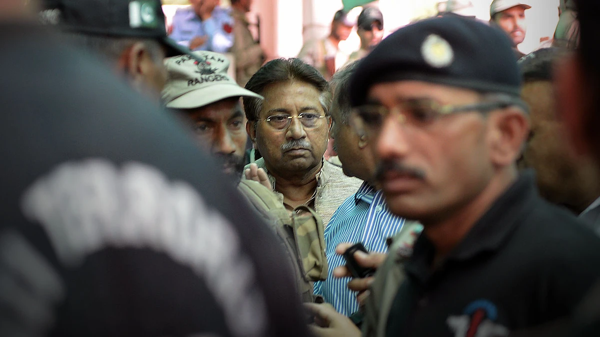In this file photo, former Pakistani president Pervez Musharraf, center, is escorted by soldiers as he arrives at an anti-terrorism court in Islamabad on April 20, 2013. (AFP)