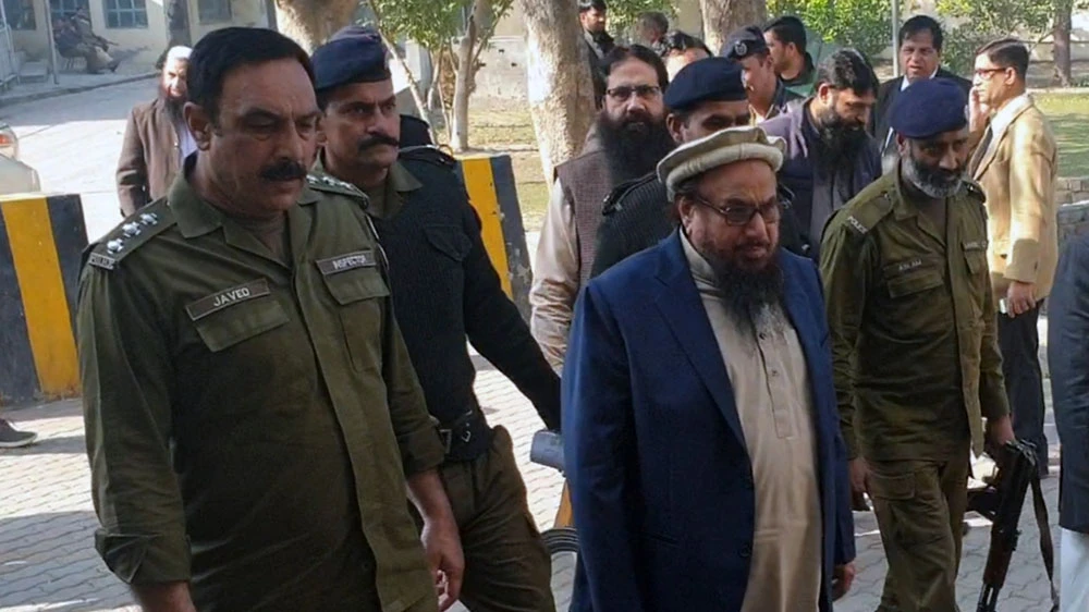 Chief of the proscribed Jamaat-ud-Dawa organization Hafiz Saeed is taken to an Anti-Terrorism Court in Lahore on Dec. 7, 2019. (Supplied)