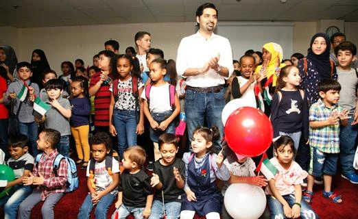 Omar Farooqui with the children at the opening of the academy. (Photo Credit: Hope Academy)