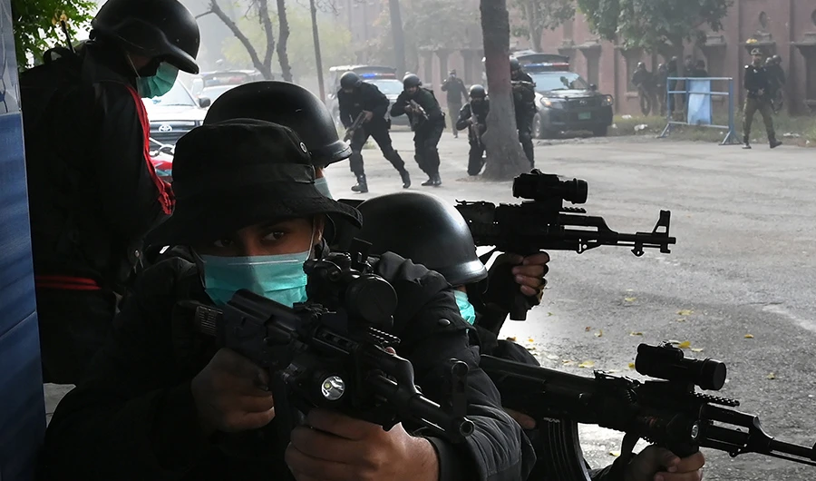 Pakistani police commandos take part in an anti-terrorism drill outside the Marriyam Muqaddasa Church ahead of Christmas celebrations in Lahore on December 23, 2019. (AFP)
