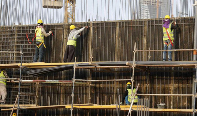 Asian labourers work at the construction site of a building in Riyadh, Saudi Arabia, November 16, 2014. (Reuters/ File Photo)