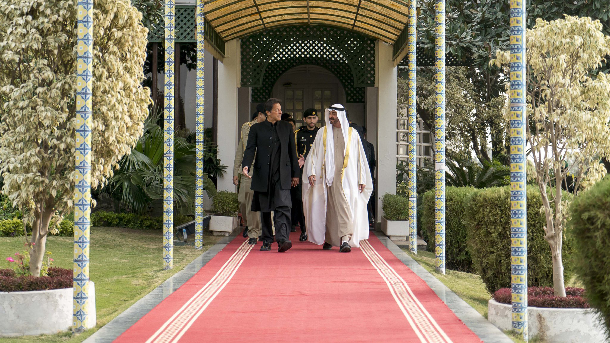 Crown Prince of Abu Dhabi and Deputy Supreme Commander of the United Arab Emirates (UAE) Armed Forces Sheikh Mohammed bin Zayed Al-Nahyan along with Pakistan PM Imran Khan arrive at Prime Minister House in Islamabad on Jan. 2, 2019. (Supplied)