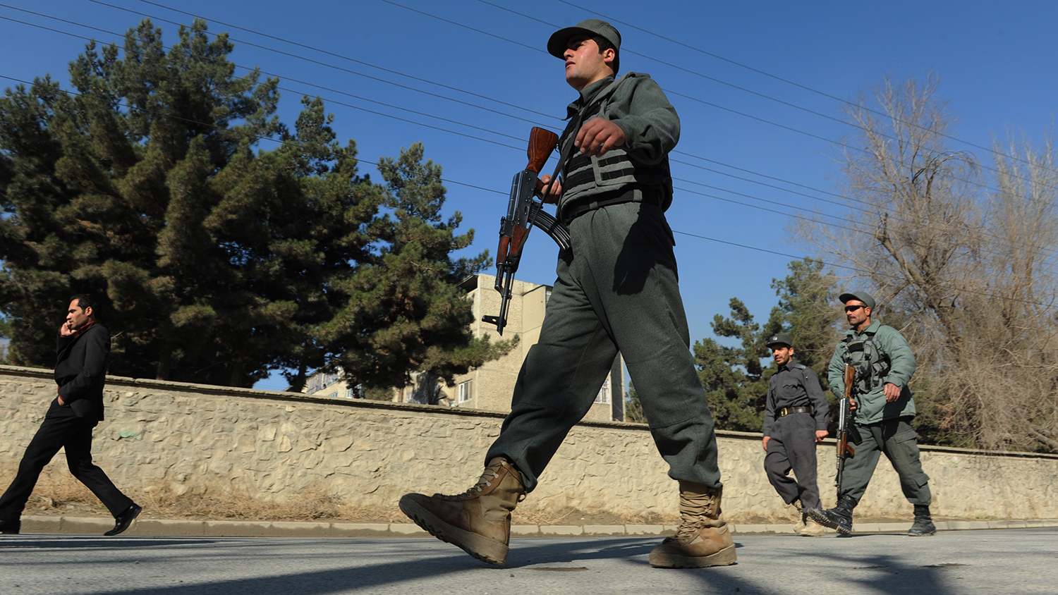 In this file photo, Afghan security forces are pictured near the main gate of the National Directorate of Security (NDS) in Kabul on Dec. 12, 2013. A Pakistani professional, who was picked up by Afghan intelligence operatives in Kabul on Wednesday, was released by the authorities. (AFP)