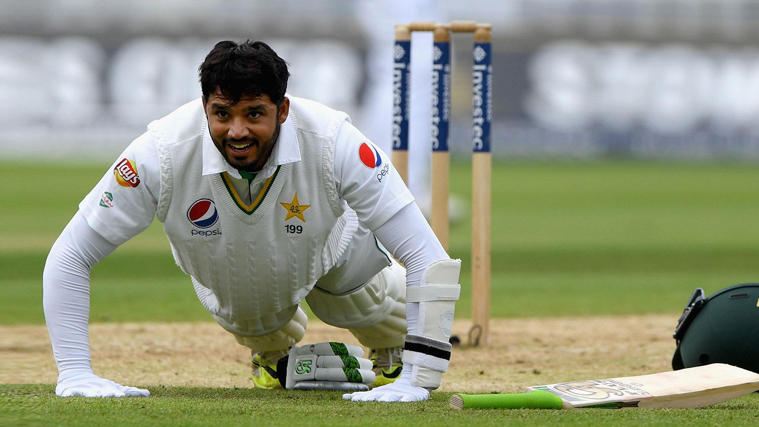 In this file photo, Pakistan's Azhar Ali celebrates his century by doing push ups during third test against England at Edgbaston in Birmingham on Aug. 4, 2016. (Action Images via Reuters)
