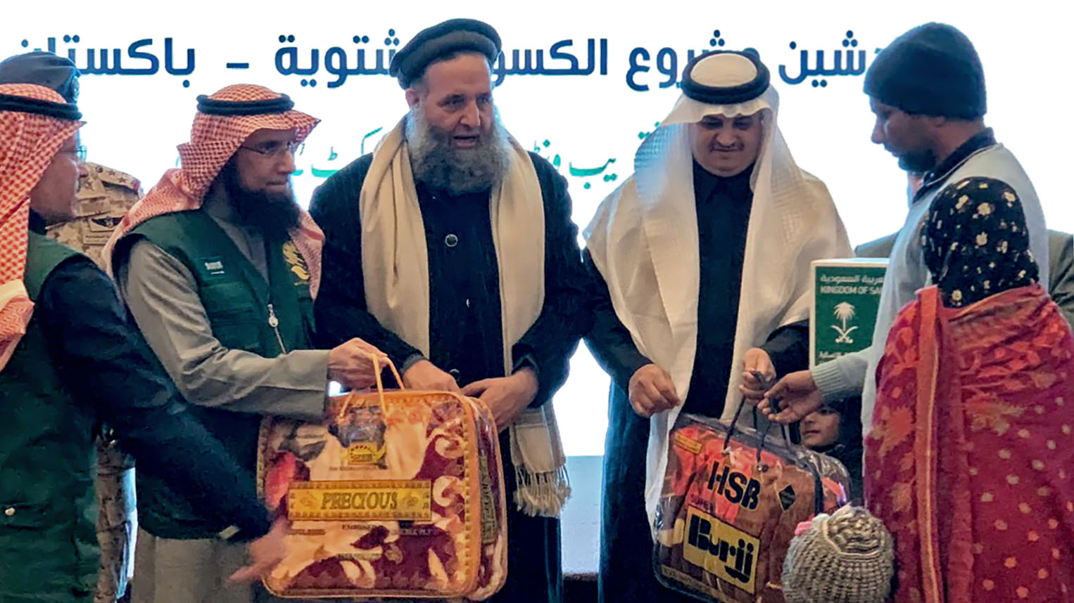 Religious Affairs Minister Noor-ul-Haq Qadri, Saudi Ambassador Nawaf bin Said Al-Malki launch KSRelief’s winter aid in Islamabad, Jan. 6, 2020. (AN photo)