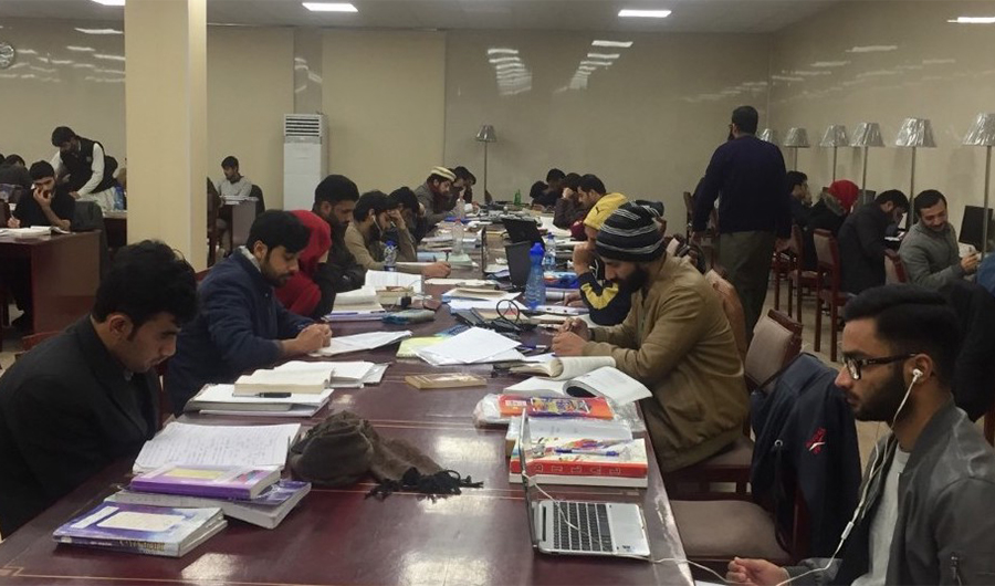In this photo, people are reading books at the UAE pavilion in Pakistan's national library on Jan 10, 2020. (AN Photo)