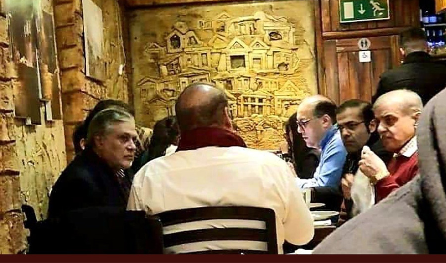 Pakistan's former prime minister, Nawaz Sharif, is seen sitting with friends and family members at a cafe in London on Jan. 13, 2020. (Photo courtesy: Social media)